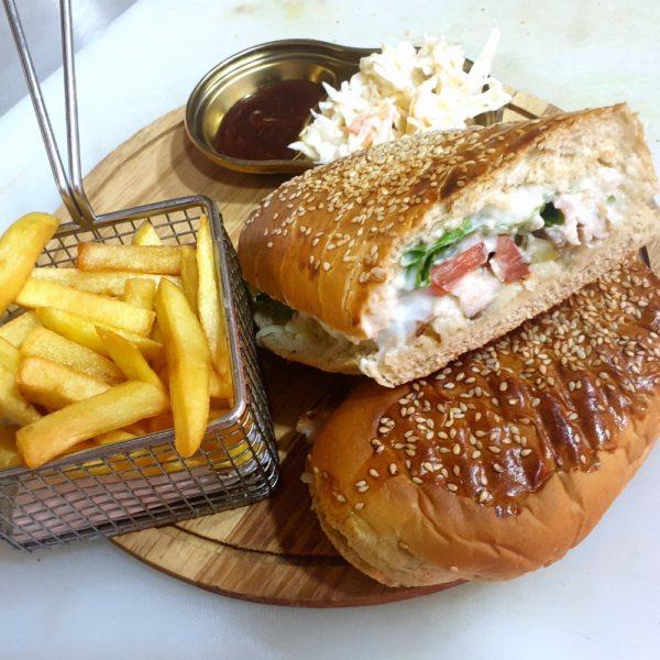 Chicken sub sandwich from Bob's Diner, featuring intercontinental cuisine in Lagos with succulent chicken, fresh vegetables, and a soft sub roll